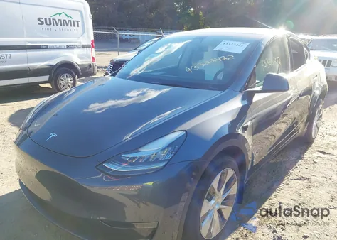 2023 Tesla Model Y Awd/Long Range Dual Motor All-Wheel Drive z USA, uszkodzony, nr VIN 7SAYGDEE6PA091538